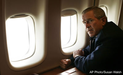 President Bush pauses after having a look from the window of Air Force One of the damage to New Orleans from Hurricane Katrina. AP Photo/Susan Walsh