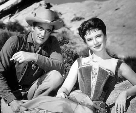 James Arness and Amanda Blake from Gunsmoke, 1956. MPTV.net